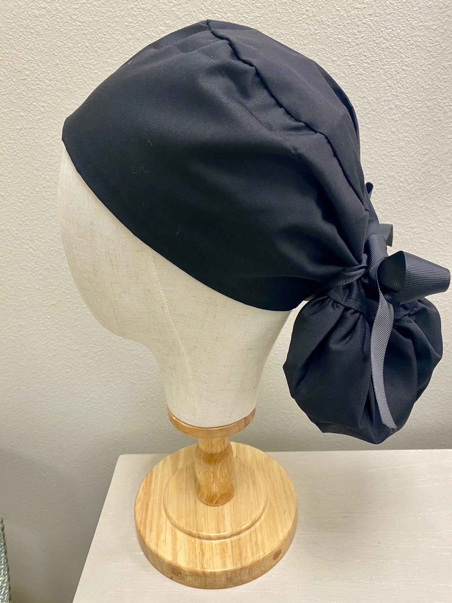 Black satin lined surgical scrub cap