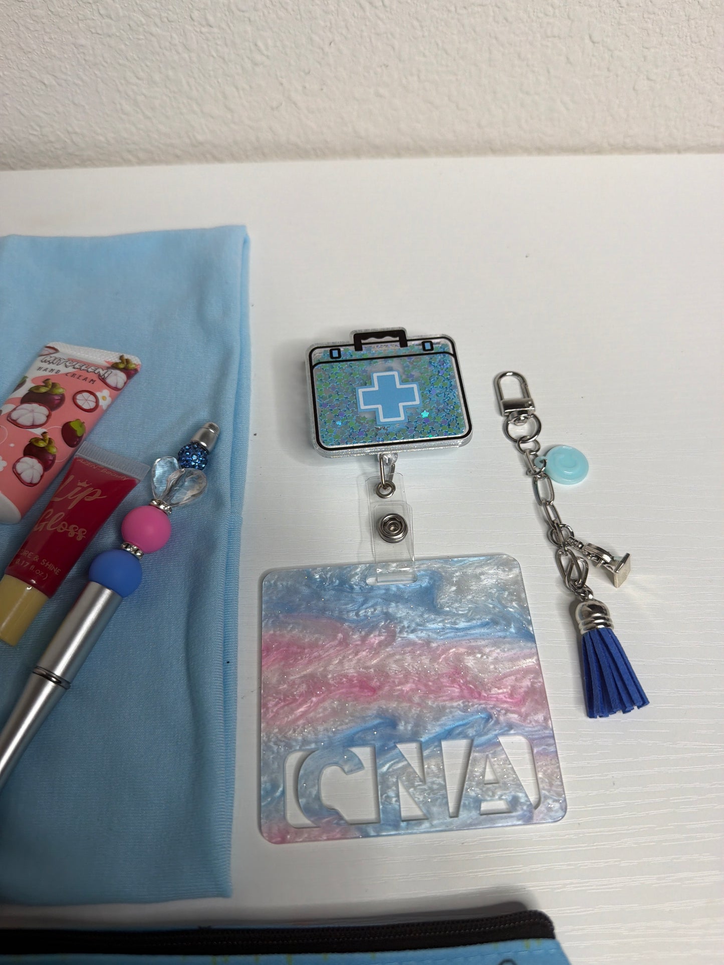Blue shaker badge reel cna set