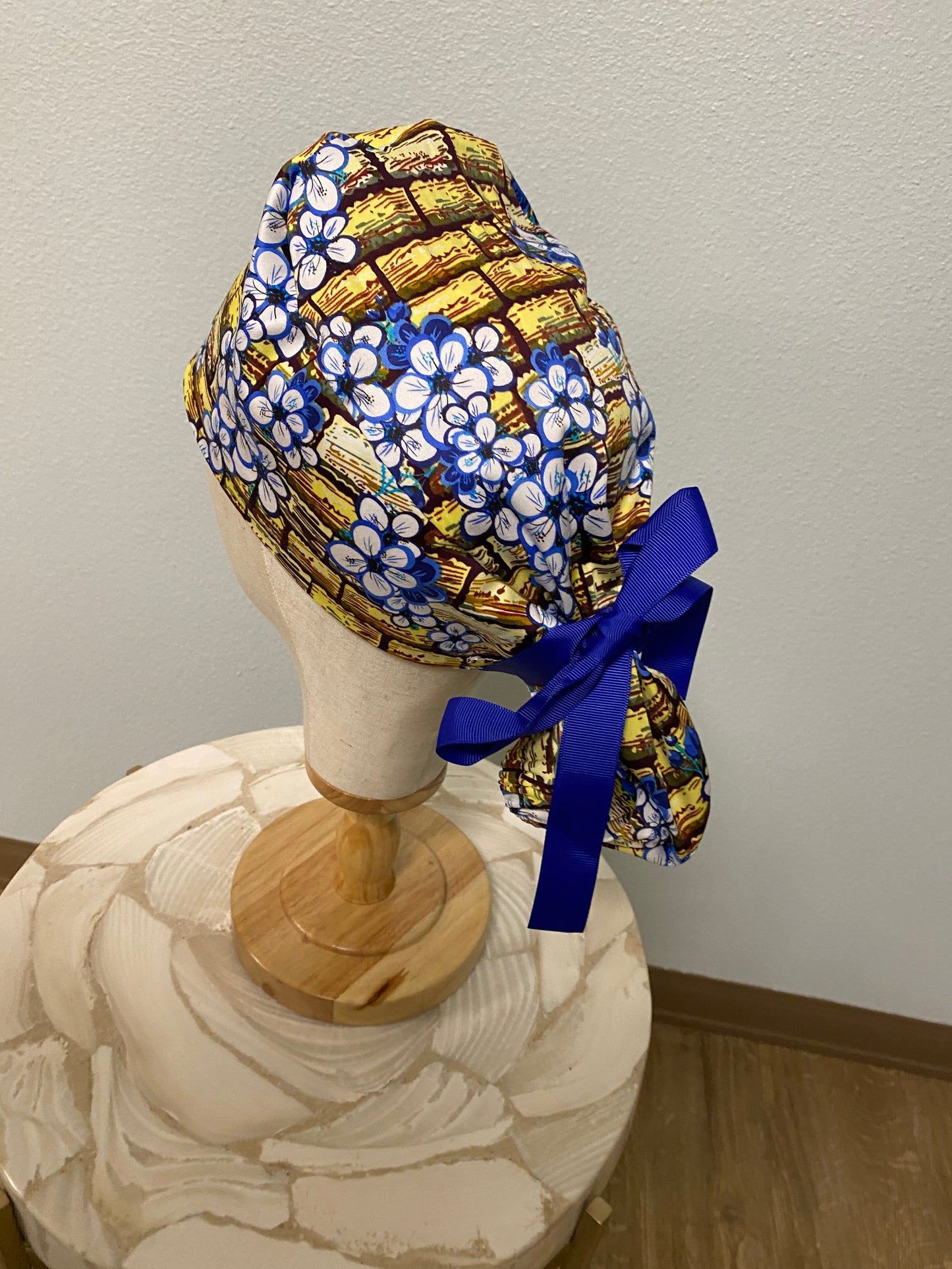 Gold and navy floral tie up surgical scrub cap
