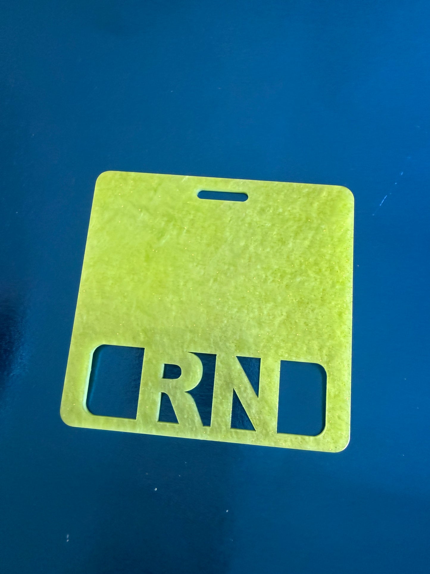 Light green rn badge buddy