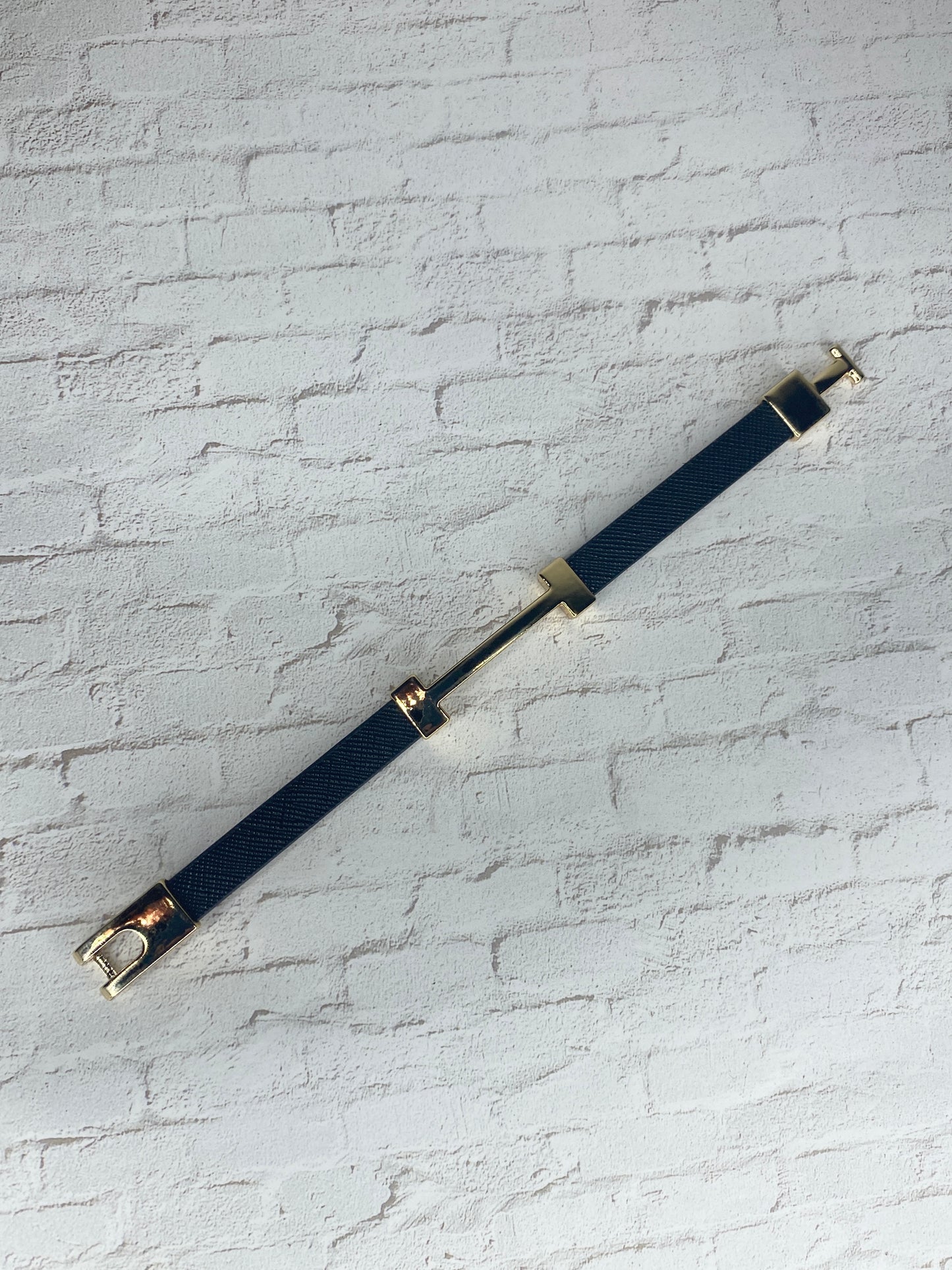 18k plated gold and black faux leather clasp bracelet