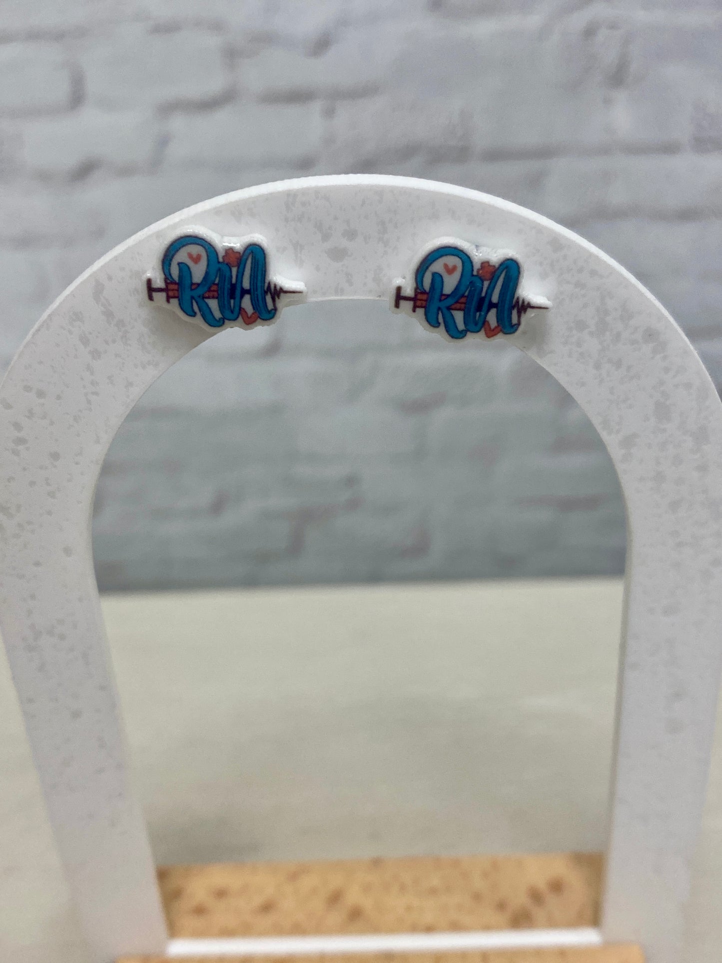 Rn stud earrings