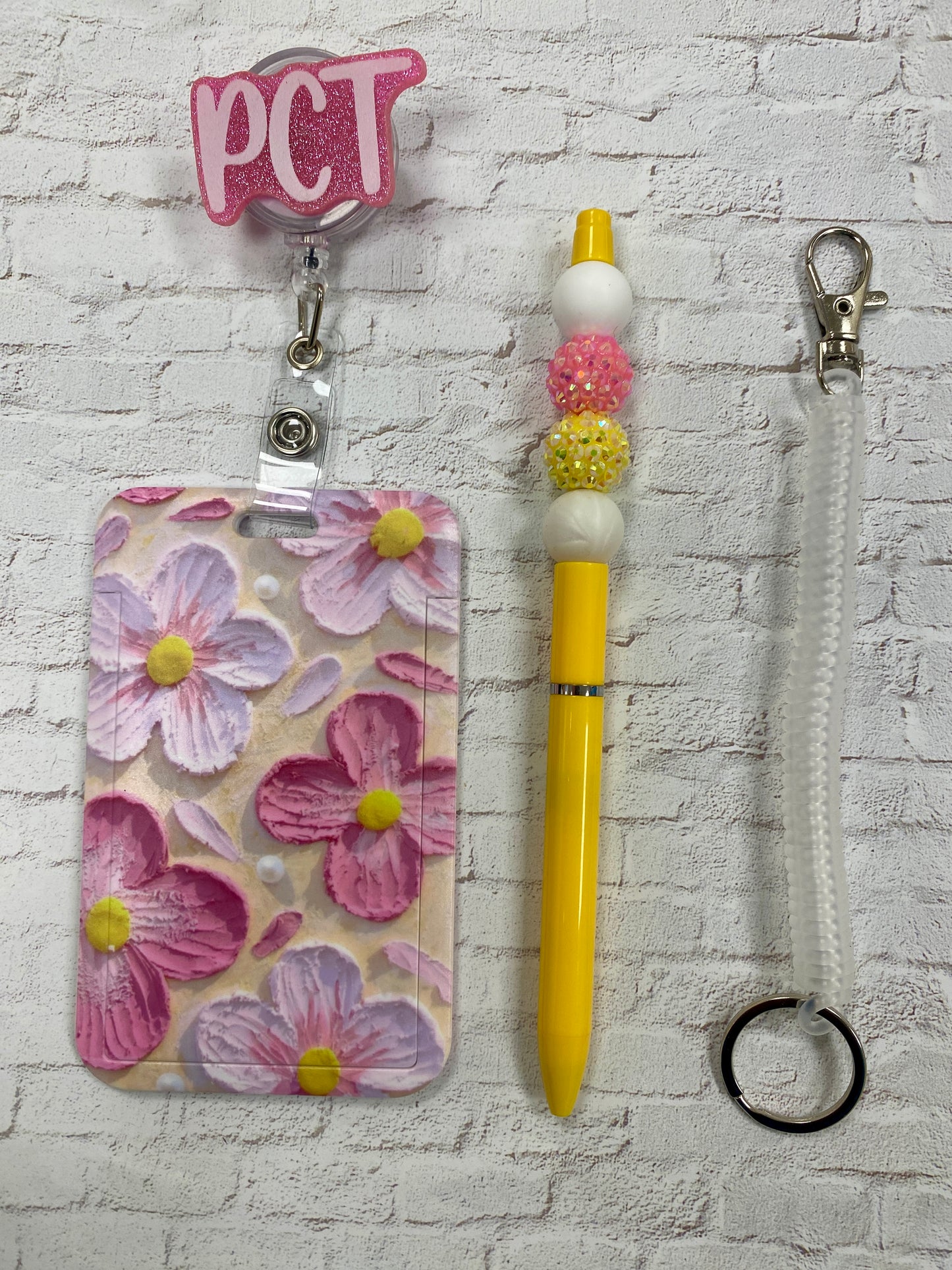 Yellow and pink PCT badge buddy/pen combo