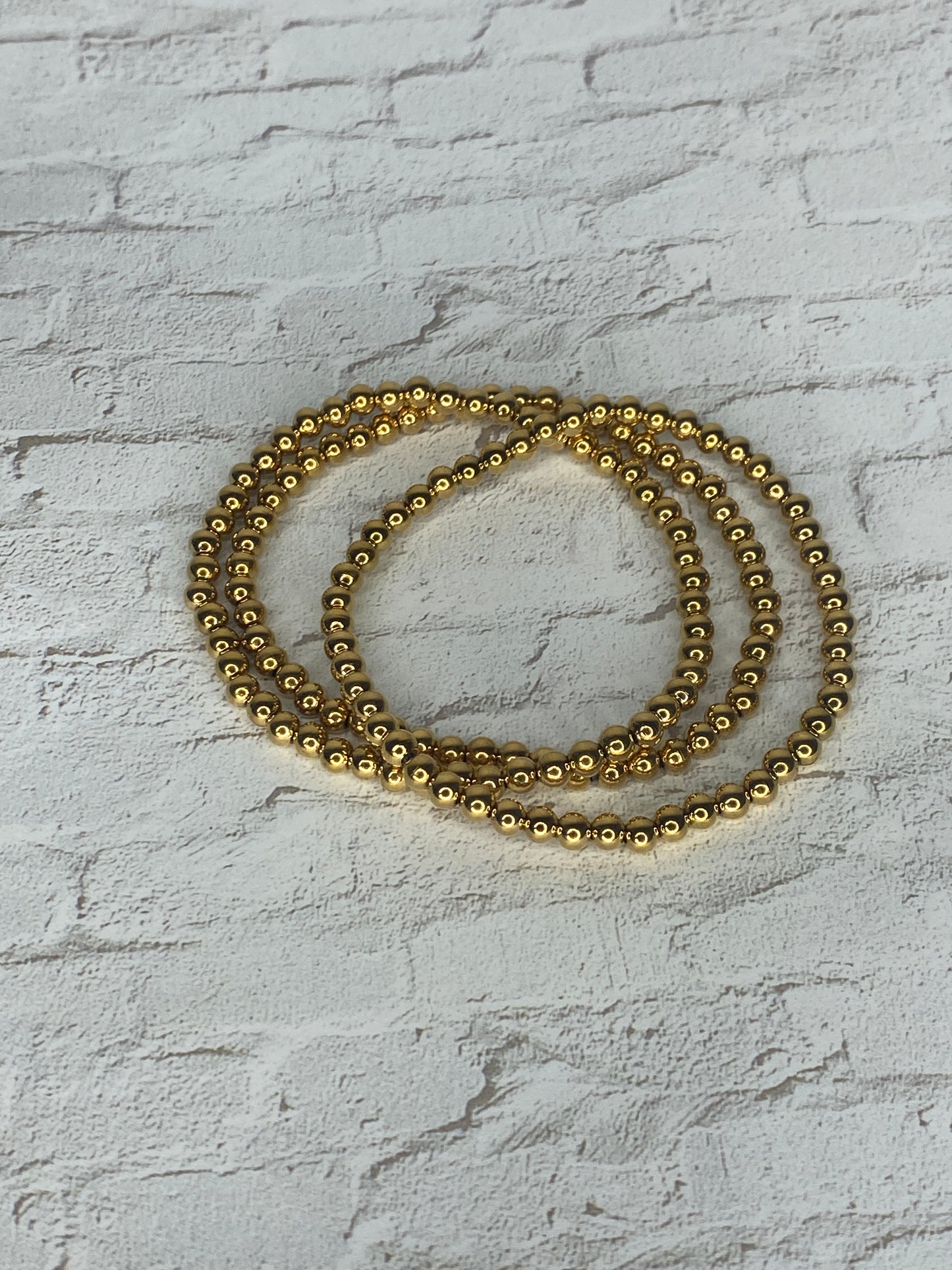 Set of 2 18k gold beaded bracelet (not plastic)