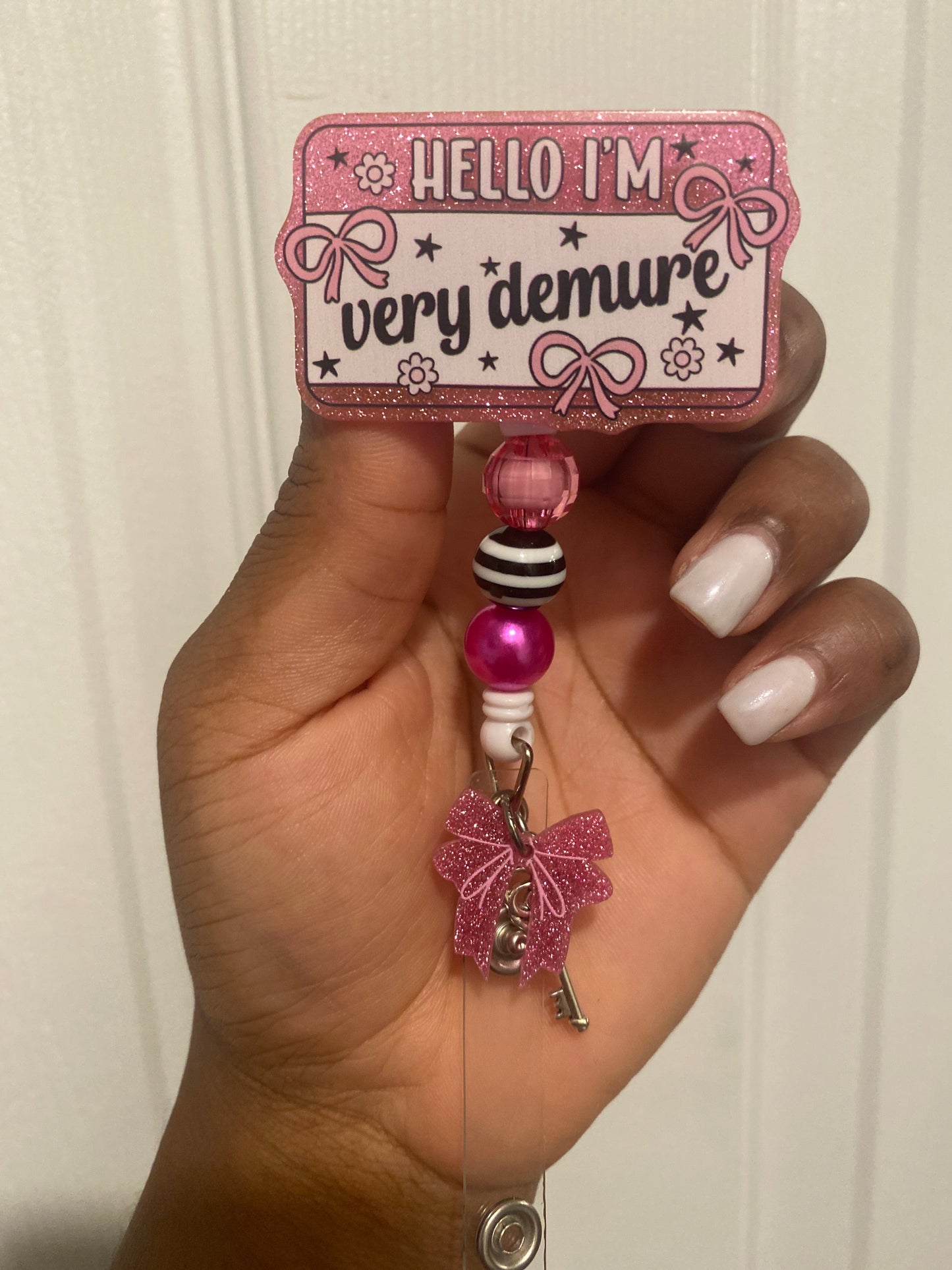 Demure badge reel