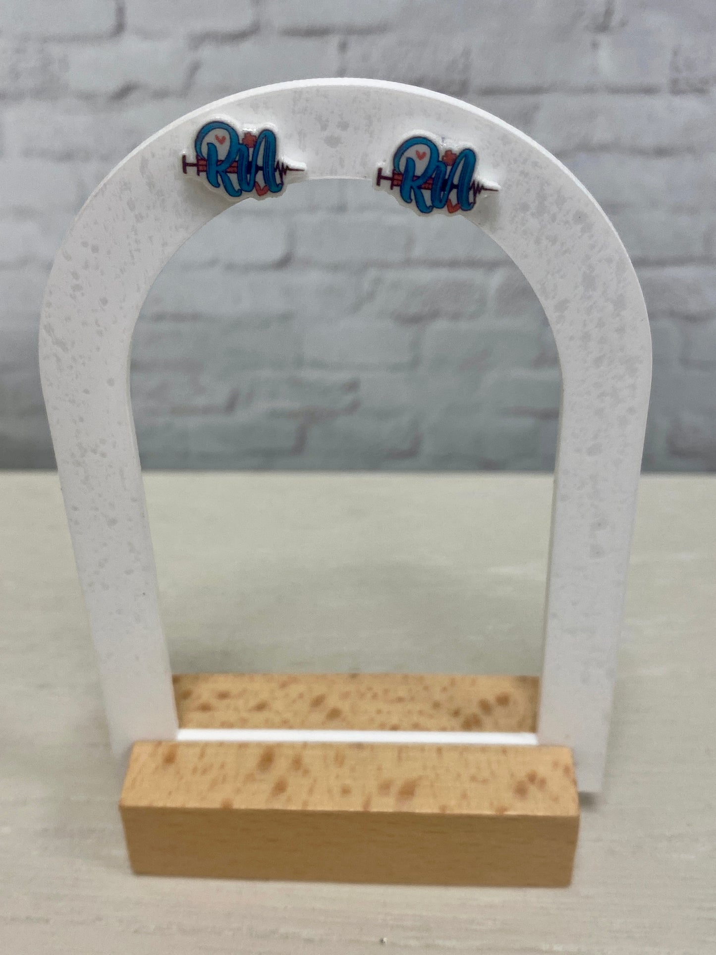 Rn stud earrings