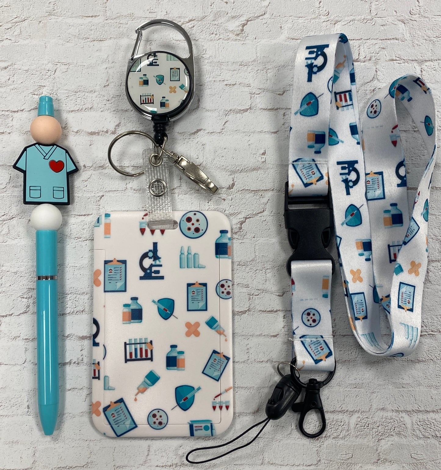 Turquoise blue & white medical themed badge buddy & pen