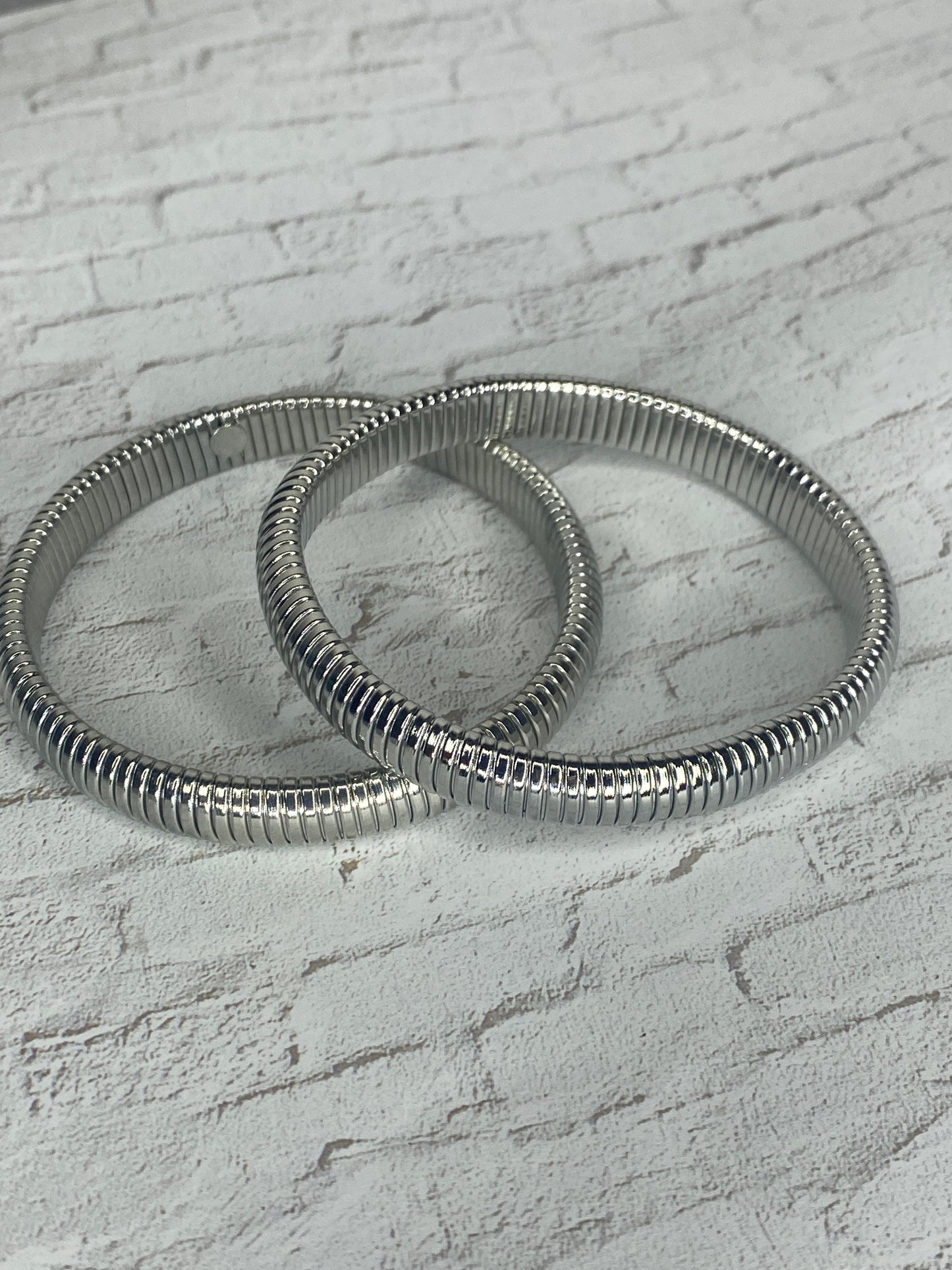 Thick stretch silver plated bangles (2 pieces)