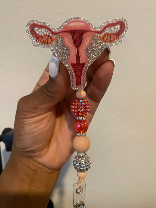 Red and silver beaded badge