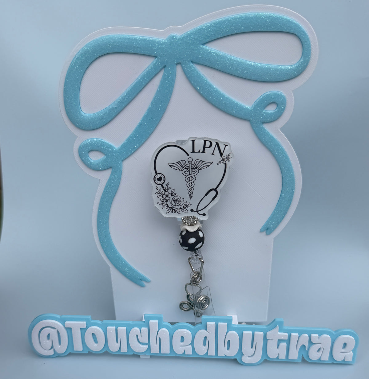 Black and white Lpn badge reel
