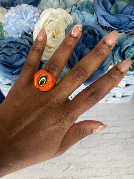 Orange and gold daisy shaped acrylic ring