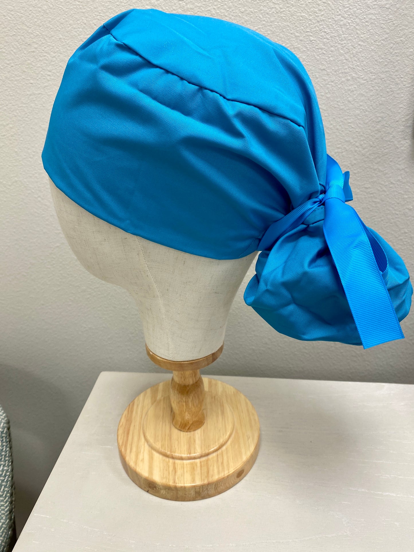 Turquoise satin lined surgical scrub cap