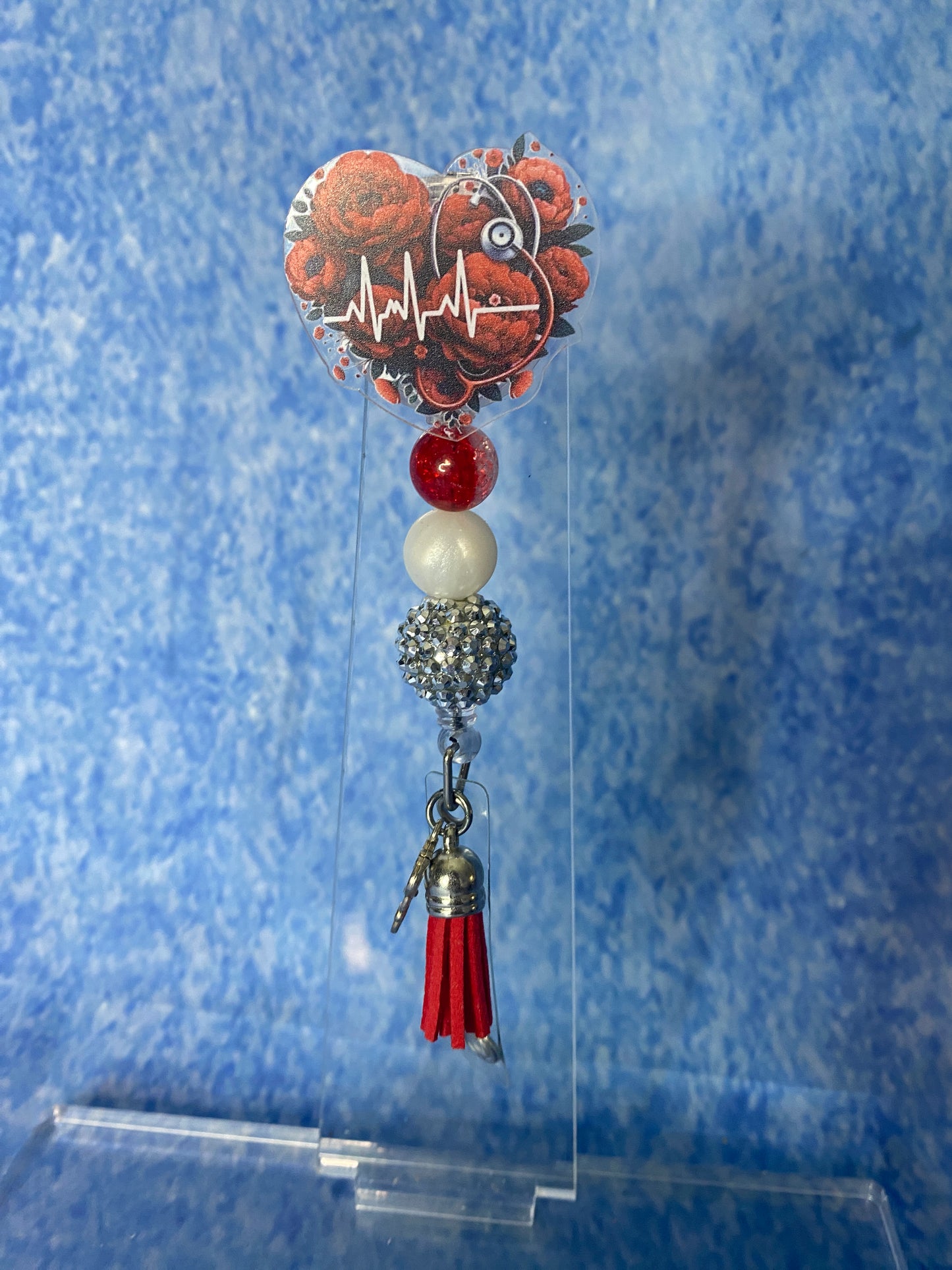 Cardiac badge reel