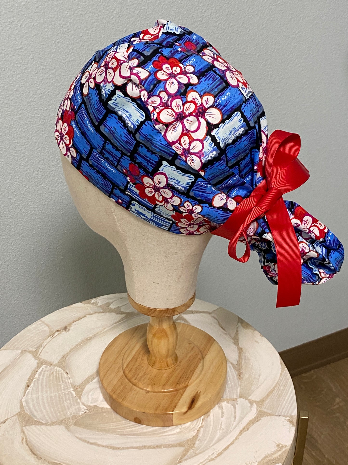 Red and navy floral tie up surgical scrub cap