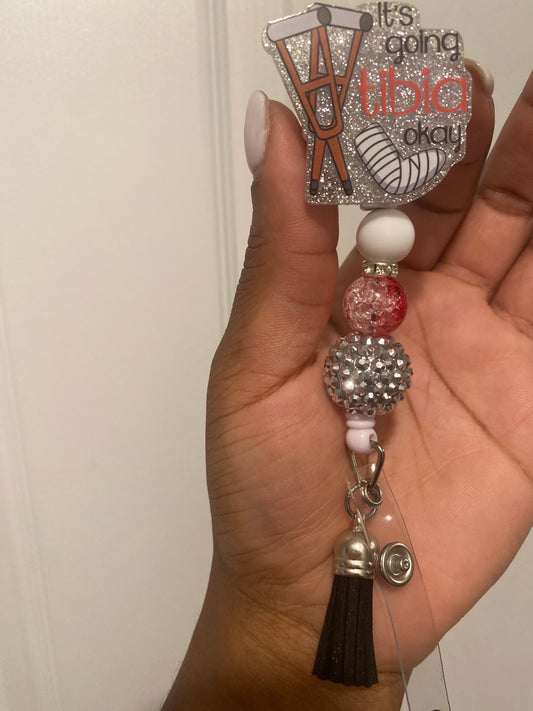 Tibia beaded badge reel