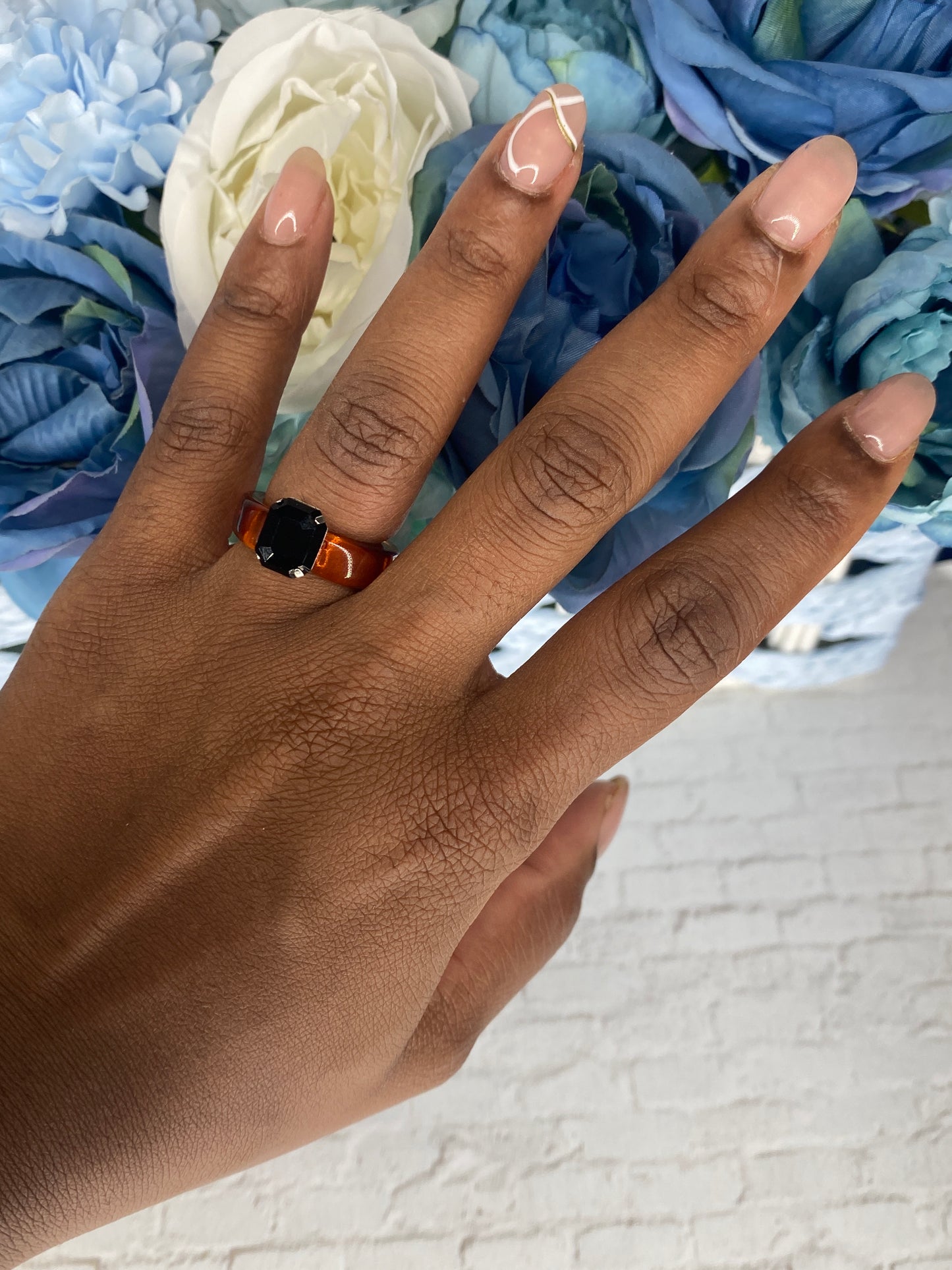 Brown acrylic ring with black stone