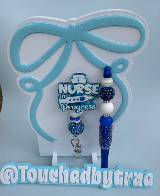 Blue rn badge reel and pen